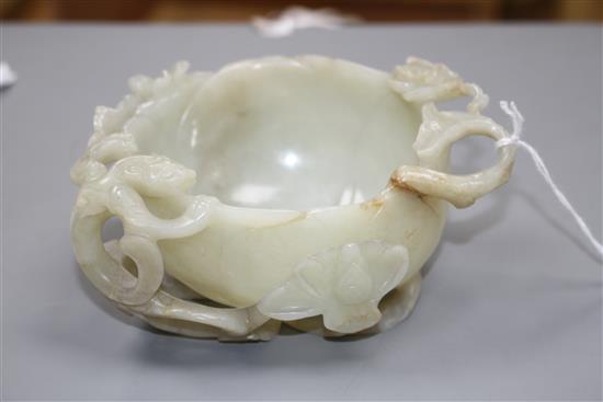 A Chinese pale celadon jade lotus cup, late Ming dynasty,